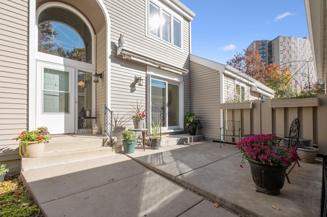 1198 Saint Clair Ave, Saint Paul, MN 55105 - view of exterior entry featuring a patio area