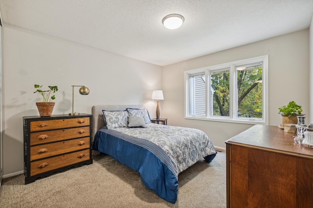 1198 Saint Clair Ave, Saint Paul, MN 55105 - carpeted bedroom featuring baseboards and a textured ceiling