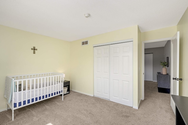 7674 Dunmore Rd, Woodbury, MN 55125 - carpeted bedroom with a closet and baseboards