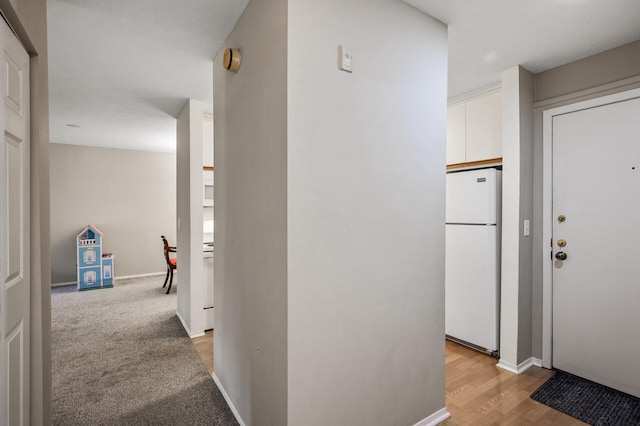 7510 Cahill Rd Unit 211B, Edina, MN 55439 - corridor featuring light wood-type flooring and baseboards