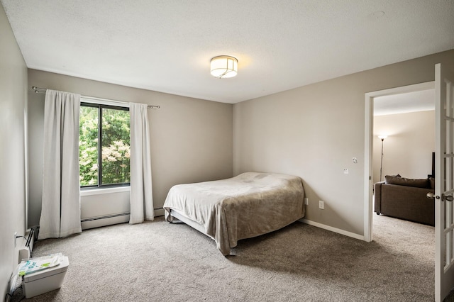 7510 Cahill Rd Unit 211B, Edina, MN 55439 - bedroom with baseboard heating and carpet
