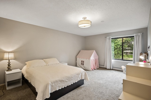 7510 Cahill Rd Unit 211B, Edina, MN 55439 - bedroom with carpet flooring, baseboard heating, and a textured ceiling