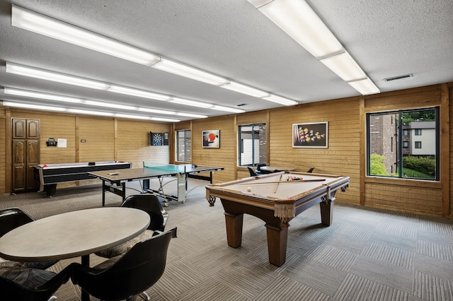 7510 Cahill Rd Unit 211B, Edina, MN 55439 - game room with billiards table, a textured ceiling, carpet, and wooden walls