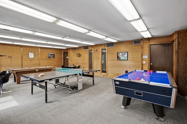 7510 Cahill Rd Unit 211B, Edina, MN 55439 - rec room with billiards table, light carpet, a textured ceiling, and wooden walls