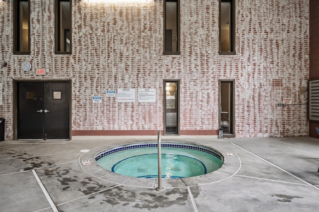 7510 Cahill Rd Unit 211B, Edina, MN 55439 - view of pool with a hot tub
