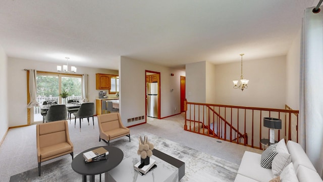 2209 18th Ave SE, Rochester, MN 55904 - living room with a chandelier, light carpet, and baseboards