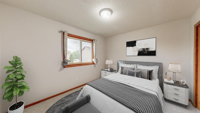 2209 18th Ave SE, Rochester, MN 55904 - bedroom with light colored carpet, baseboards, and a textured ceiling