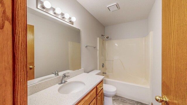 2209 18th Ave SE, Rochester, MN 55904 - bathroom with toilet, vanity, and shower / bath combination