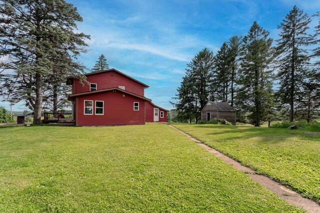 N8355 330th St, Gilman Twp, WI 54767 - view of grassy yard with a wooden deck