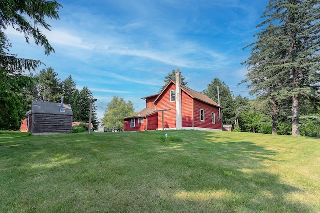 N8355 330th St, Gilman Twp, WI 54767 - view of green lawn featuring an outbuilding