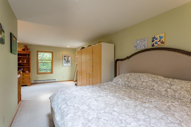 N8355 330th St, Gilman Twp, WI 54767 - bedroom with baseboard heating, light colored carpet, and baseboards