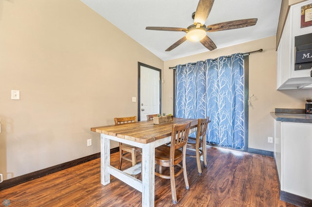 226 12th Ave W, West Fargo, ND 58078 - dining room featuring a ceiling fan, dark wood finished floors, vaulted ceiling, and baseboards