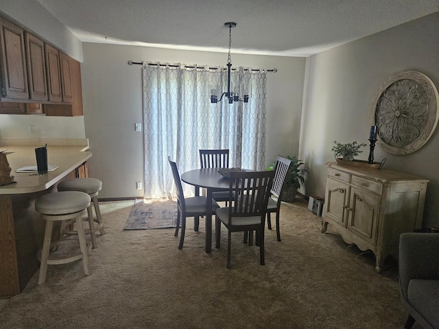 1427 Canary Dr, Albert Lea, MN 56007 - dining area featuring a chandelier, light colored carpet, and a textured ceiling