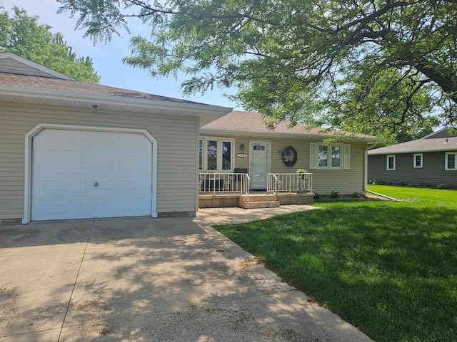 1427 Canary Dr, Albert Lea, MN 56007 - single story home featuring covered porch, driveway, a garage, and a front yard