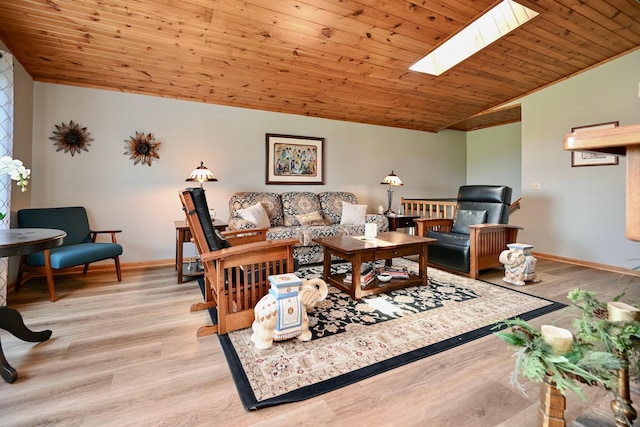 206 Skyline Hts, Wabasha, MN 55981 - living area with a skylight, wooden ceiling, wood finished floors, vaulted ceiling, and baseboards