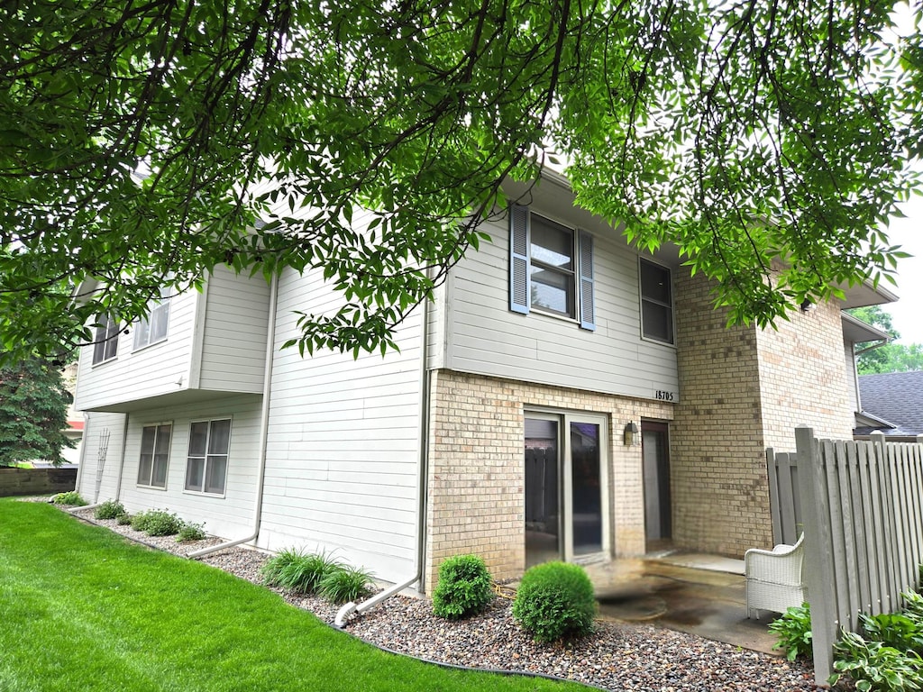 18705 Clear View Ct, Minnetonka, MN 55345 - rear view of property featuring brick siding