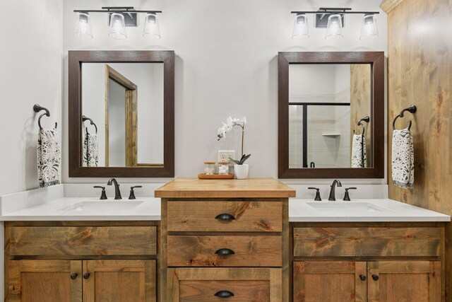 1843 Campfire Dr E, Waconia, MN 55387 - bathroom featuring two vanities and a stall shower