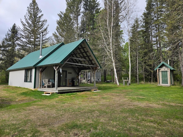 3573 Kallio Rd, Orr, MN 55771 - view of grassy yard featuring an outbuilding