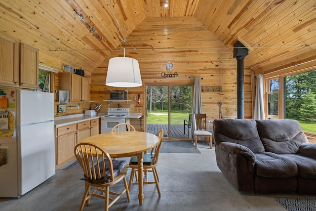 3573 Kallio Rd, Orr, MN 55771 - dining room featuring wooden ceiling, lofted ceiling, plenty of natural light, rail lighting, and wood walls