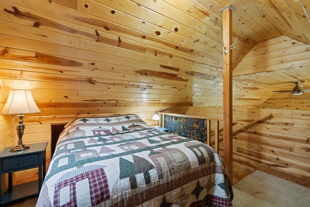 3573 Kallio Rd, Orr, MN 55771 - bedroom featuring carpet, wood walls, wood ceiling, and vaulted ceiling