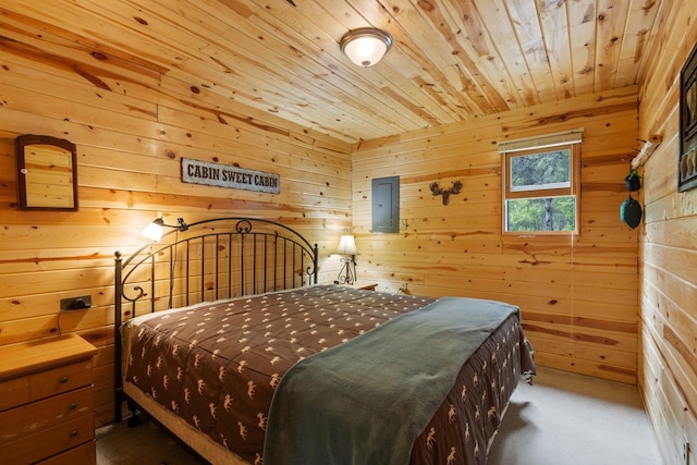 3573 Kallio Rd, Orr, MN 55771 - carpeted bedroom with wooden ceiling, wood walls, and electric panel