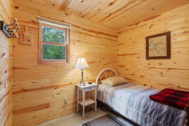 3573 Kallio Rd, Orr, MN 55771 - bedroom with wood walls, carpet floors, and wooden ceiling