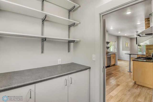 1036 12th St N, Fargo, ND 58102 - bar featuring appliances with stainless steel finishes, light wood-type flooring, recessed lighting, ceiling fan, and wall chimney exhaust hood