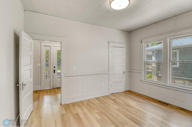 1036 12th St N, Fargo, ND 58102 - empty room with light wood finished floors