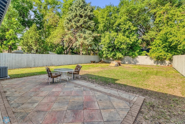 1036 12th St N, Fargo, ND 58102 - view of patio featuring outdoor dining area and cooling unit