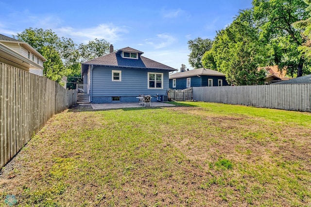 1036 12th St N, Fargo, ND 58102 - rear view of house featuring a patio area and a chimney