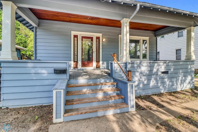 1036 12th St N, Fargo, ND 58102 - doorway to property featuring covered porch