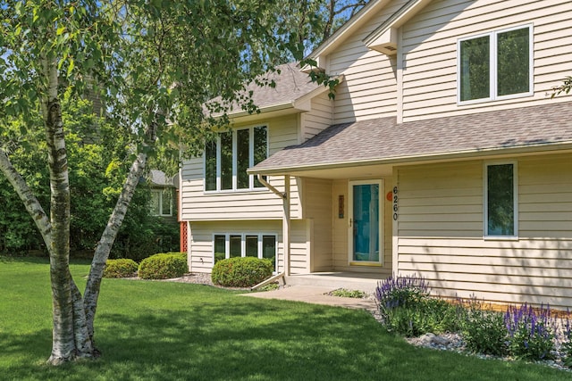 6260 Wessel Ct, Eden Prairie, MN 55346 - view of front of property featuring a front yard and roof with shingles