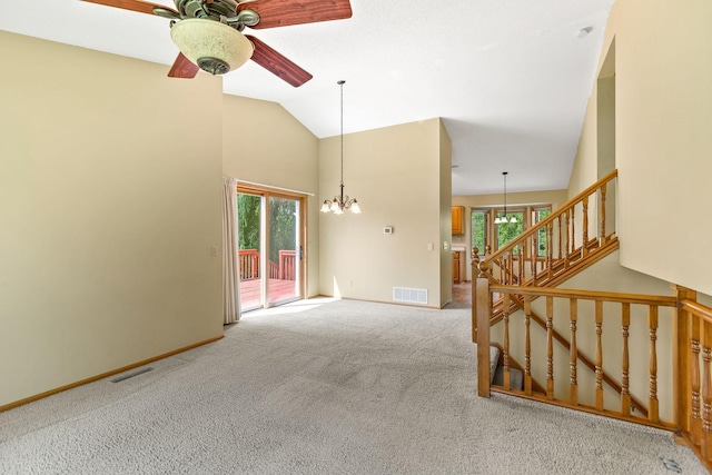 6260 Wessel Ct, Eden Prairie, MN 55346 - unfurnished living room featuring carpet floors, healthy amount of natural light, a chandelier, a ceiling fan, and high vaulted ceiling