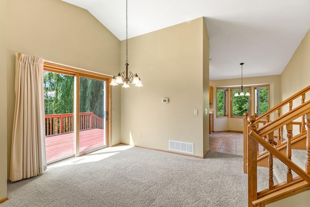 6260 Wessel Ct, Eden Prairie, MN 55346 - carpeted empty room with a chandelier, stairs, baseboards, and lofted ceiling