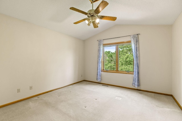 6260 Wessel Ct, Eden Prairie, MN 55346 - empty room with carpet, baseboards, vaulted ceiling, and ceiling fan