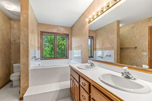 6260 Wessel Ct, Eden Prairie, MN 55346 - bathroom featuring toilet, a garden tub, tile patterned floors, double vanity, and a textured ceiling