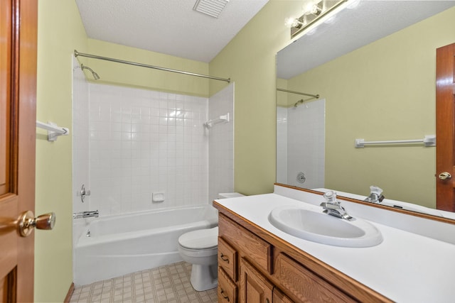 6260 Wessel Ct, Eden Prairie, MN 55346 - bathroom with toilet, vanity, tub / shower combination, and a textured ceiling