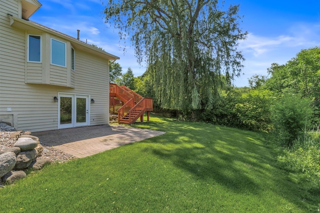 6260 Wessel Ct, Eden Prairie, MN 55346 - view of green lawn with a patio area, stairs, and a deck