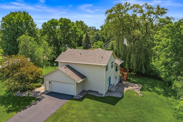 6260 Wessel Ct, Eden Prairie, MN 55346 - view of home's exterior featuring a garage, a yard, asphalt driveway, a view of trees, and a shingled roof