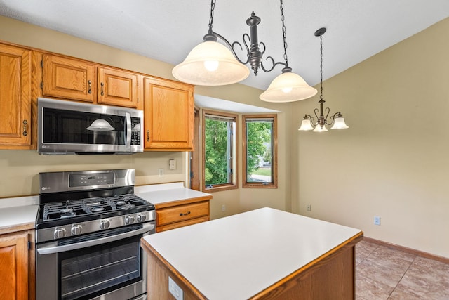 6260 Wessel Ct, Eden Prairie, MN 55346 - kitchen featuring stainless steel appliances, light countertops, decorative light fixtures, a chandelier, and a kitchen island