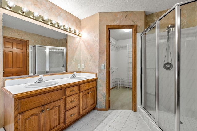 6260 Wessel Ct, Eden Prairie, MN 55346 - full bath with a textured ceiling, a stall shower, double vanity, and a walk in closet