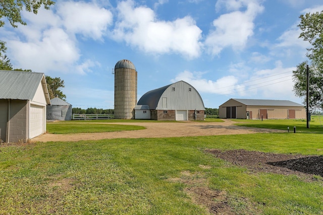 37454 605th Ave, Bluffton Twp, MN 56518 - view of barn featuring a yard and driveway