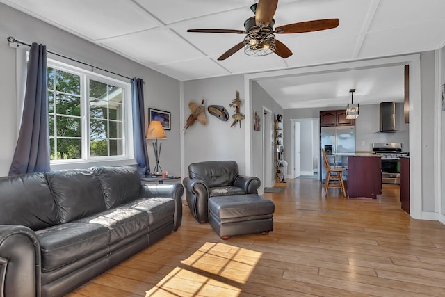 37454 605th Ave, Bluffton Twp, MN 56518 - living room with a ceiling fan and light wood-style flooring