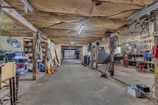 37454 605th Ave, Bluffton Twp, MN 56518 - below grade area with a workshop area