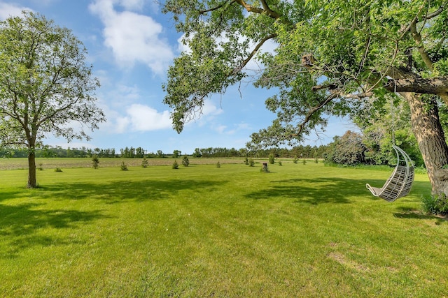 37454 605th Ave, Bluffton Twp, MN 56518 - view of green lawn featuring a view of rural / pastoral area