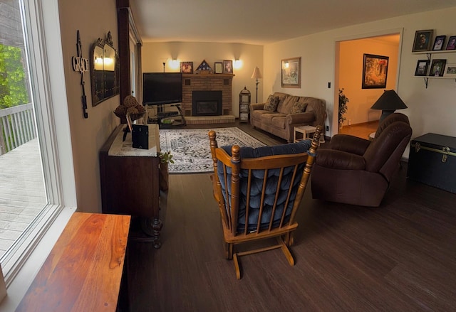 30055 Shore Dr, Pengilly, MN 55775 - living area featuring dark wood-type flooring and a brick fireplace