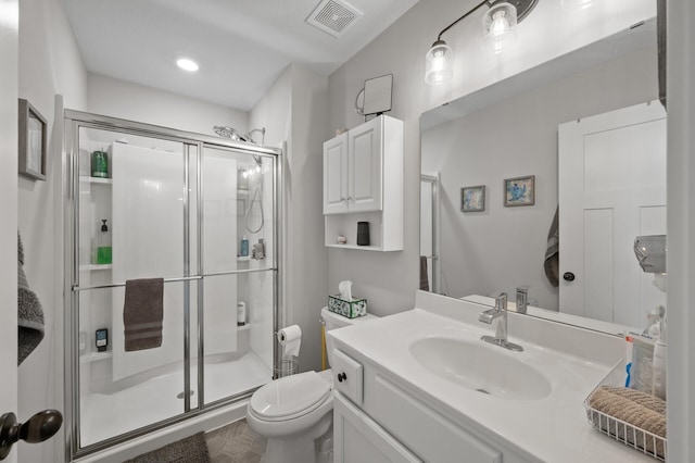 5945 178th St W, Lakeville, MN 55044 - full bathroom featuring toilet, a stall shower, and vanity