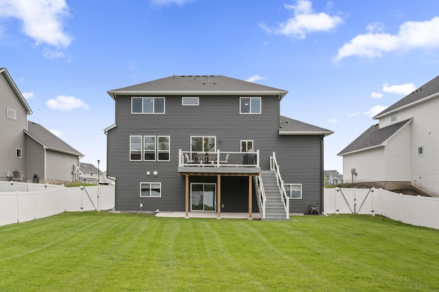 5945 178th St W, Lakeville, MN 55044 - rear view of house with a gate, a wooden deck, stairs, and a patio