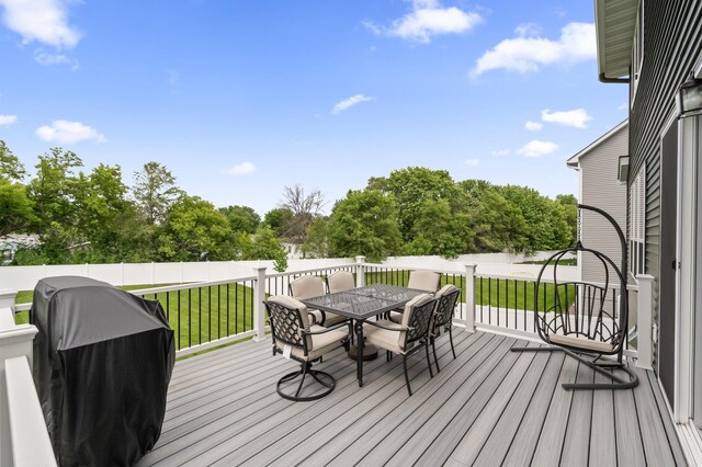 5945 178th St W, Lakeville, MN 55044 - deck with outdoor dining space and view of wooded area