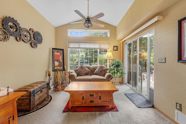 513 2nd Ave SW, Lonsdale, MN 55046 - living area featuring carpet flooring, ceiling fan, healthy amount of natural light, and high vaulted ceiling